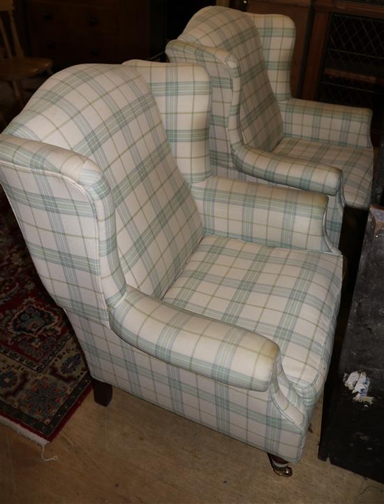 Pair mahogany framed wing armchairs(-)